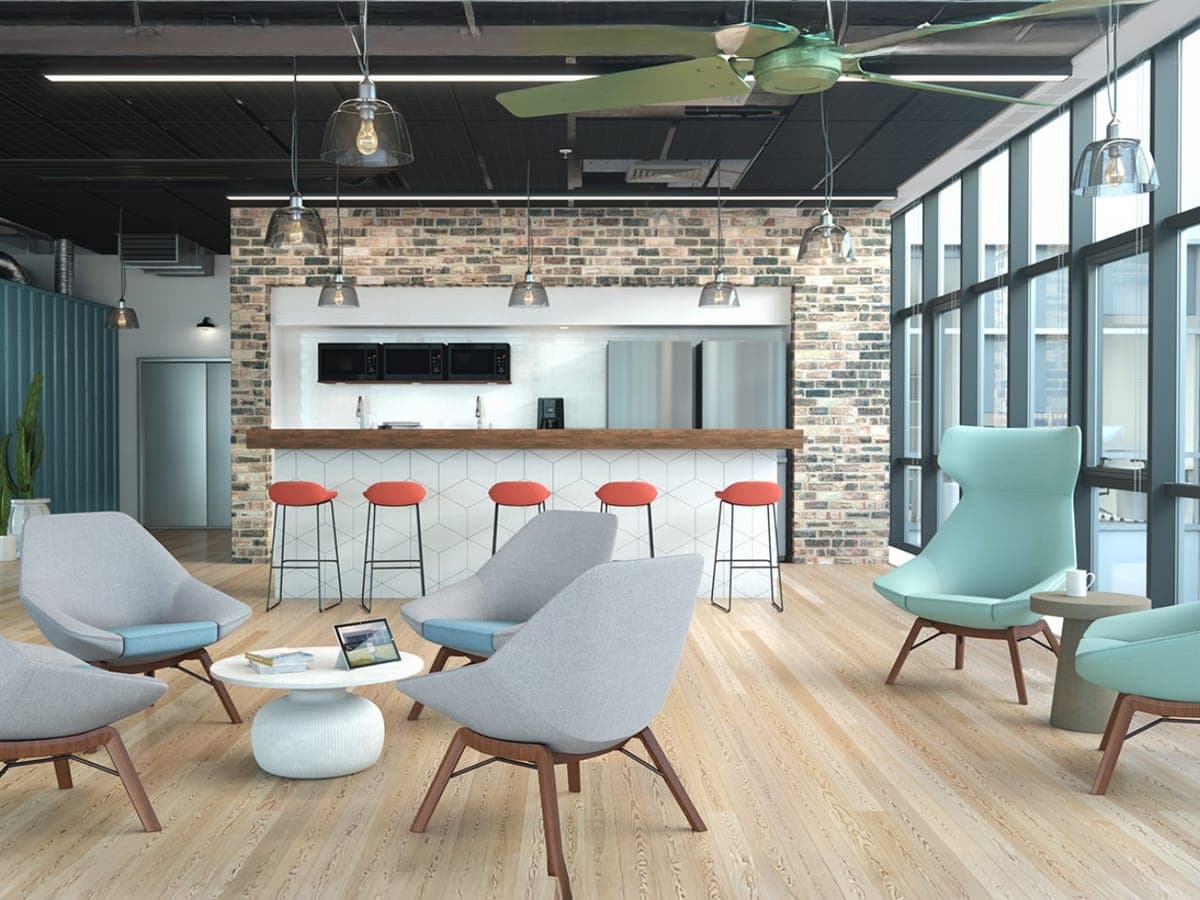 Gray and teal 9to5 Seating Jax lounge chairs around a coffee table with a café behind