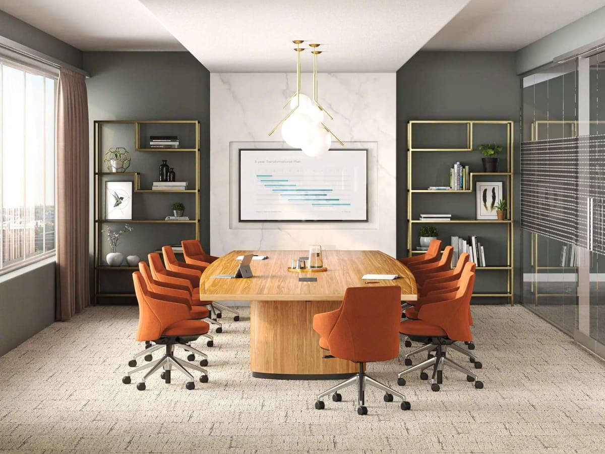 Steelcase Convene conference table with orange chairs and shelving