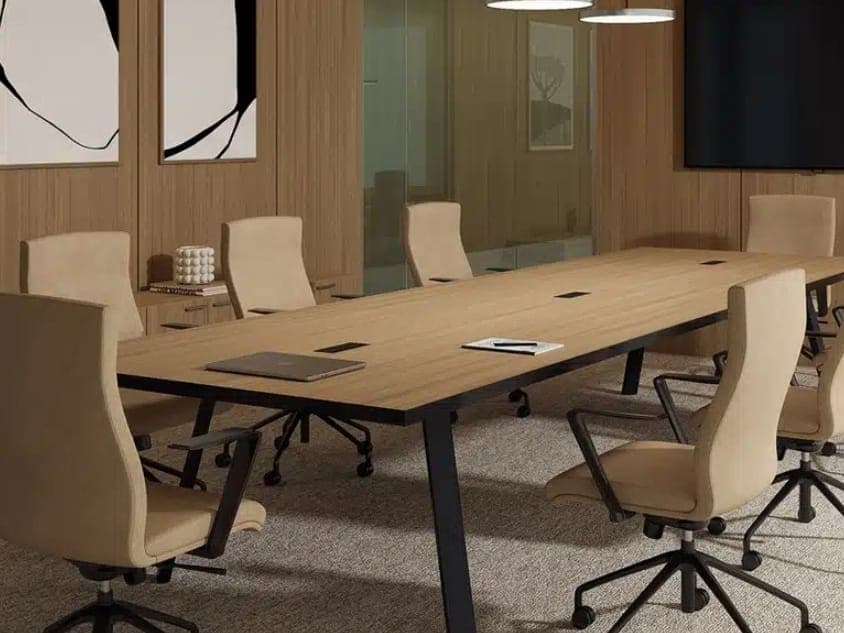 Lacasse Quorum wood conference table on black legs with beige chairs
