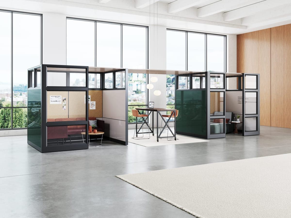 Kimball Narrate glass-framed work shelters with a lounge nook and high table