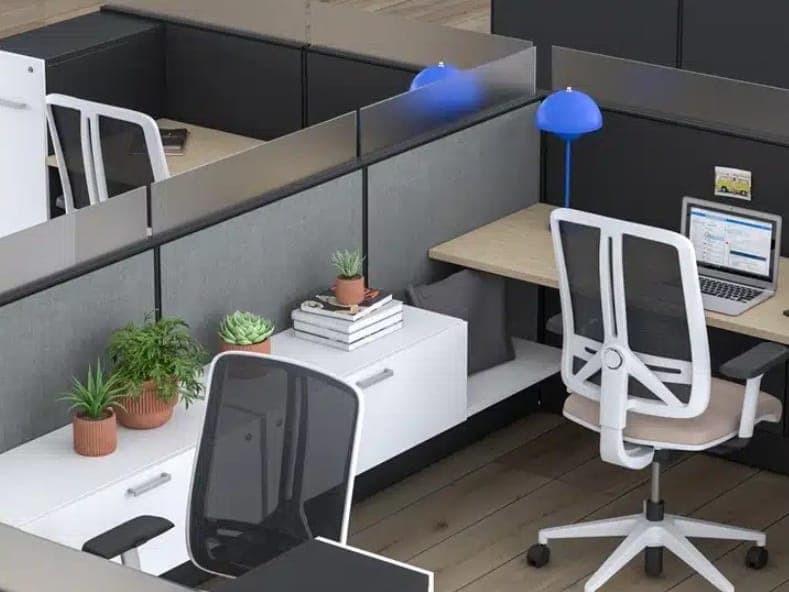Overhead view of Lacasse Paradigm workstations with dark panels and frosted toppers
