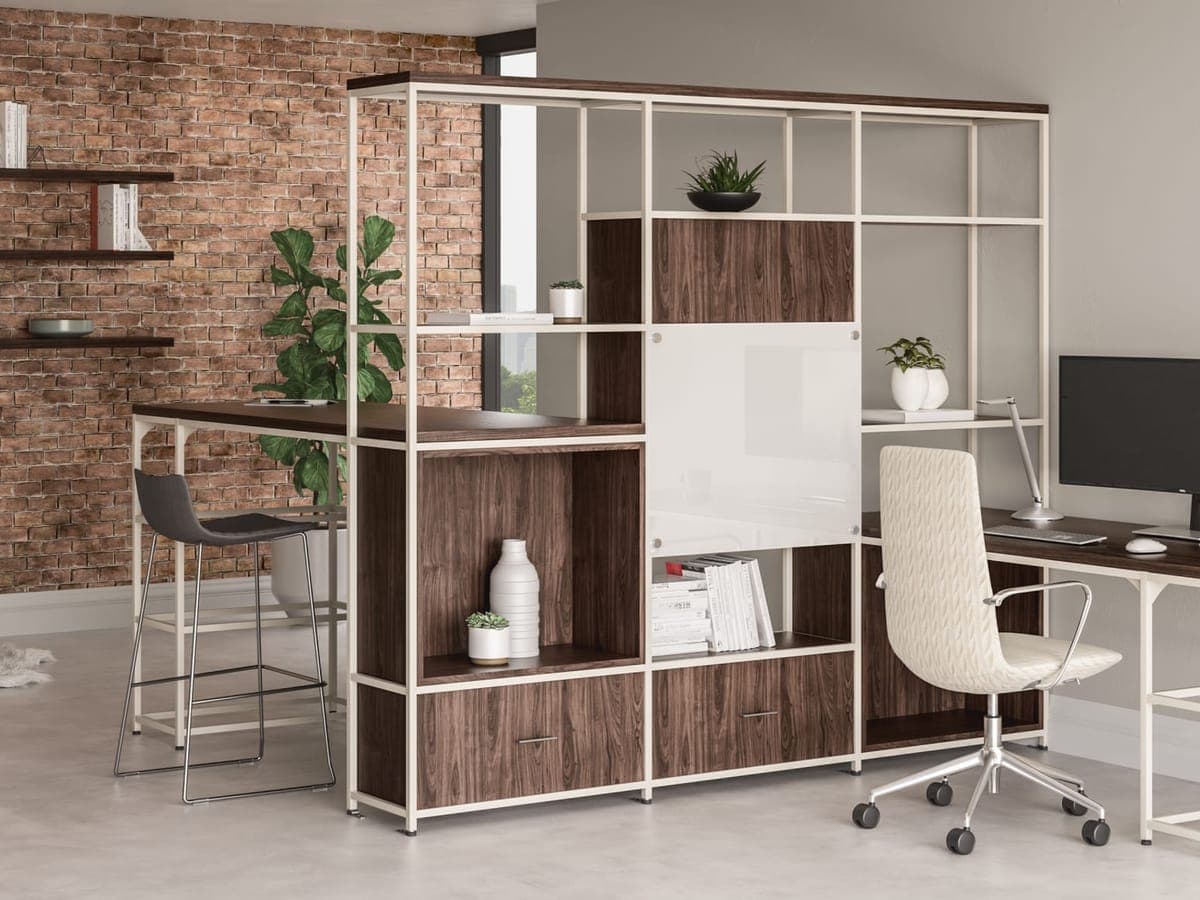 National Lochlyn white-frame shelving divider with walnut cubes against a brick wall