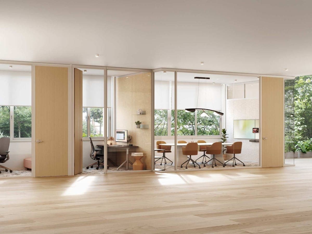 Steelcase Privacy Wall glass-front offices and a conference room with wood doors