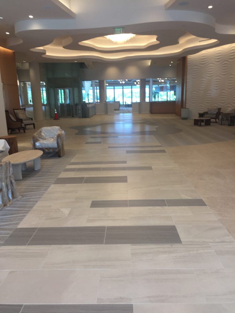 A modern common space with new tile flooring. 